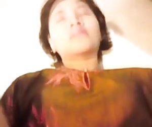 Bhean chéile, agus ag fanacht le haghaidh massage ag an óstán